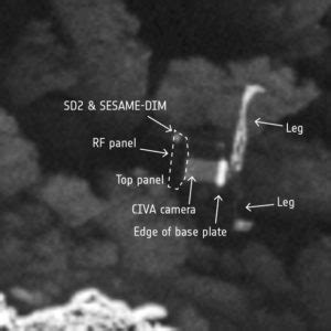 Rosetta probe spots Philae lander stuck in comet's crack