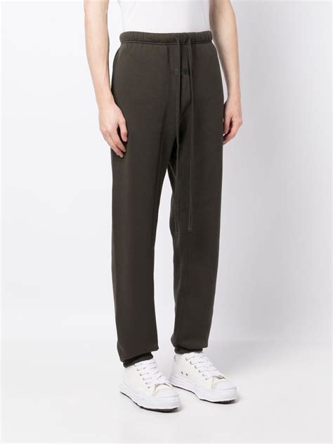 Fear Of God Essentials Logo Appliqu Track Pants Black Farfetch