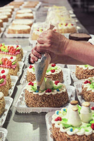 Manual Cakes Production On Factory Stock Photo Dissolve