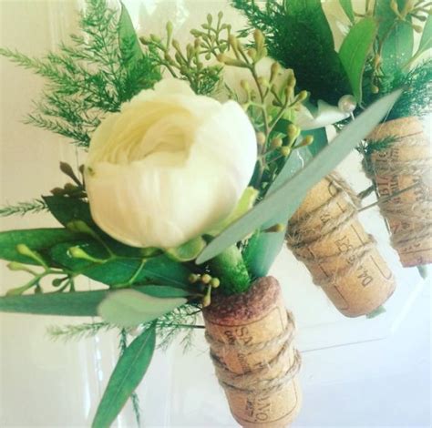 Ranunculus And Wine Cork Boutonniere For A Rustic Wine Themed Wedding