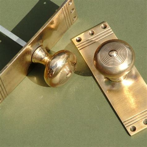 Brass Regency Mortise Knob On Back Plate