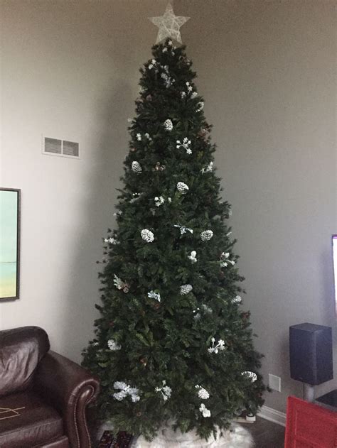 12ft Christmas Tree Decorated With Winter Wonderland Floral Picks Snow Covered Pine Cones And