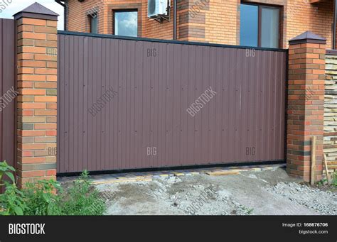 Brick Metal Fence Image & Photo (Free Trial) | Bigstock