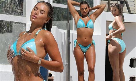 Arabella Chi Dons A Tiny Blue Bikini While Posing For Sizzling Shower