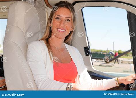 Rv Camper Van With Travel Woman Driving Motorhome Sit On Front Seat