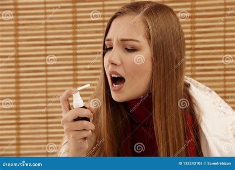 Spray For Sore Throat Photo Of A Woman Who Treats Her Throat Wi Stock