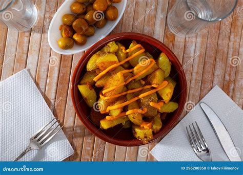 Spanish Fried Potatoes Patatas Bravas Served With Cheese Sauce And