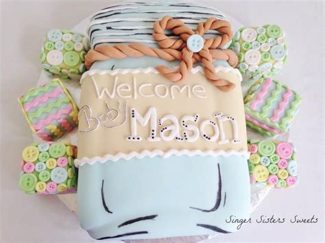 a decorated cake that says welcome to the mason