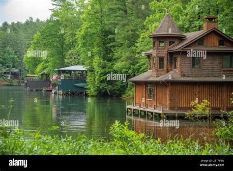 Scenic View Of Boathouses Along The Shoreline Of Lake Rabun In The Blue