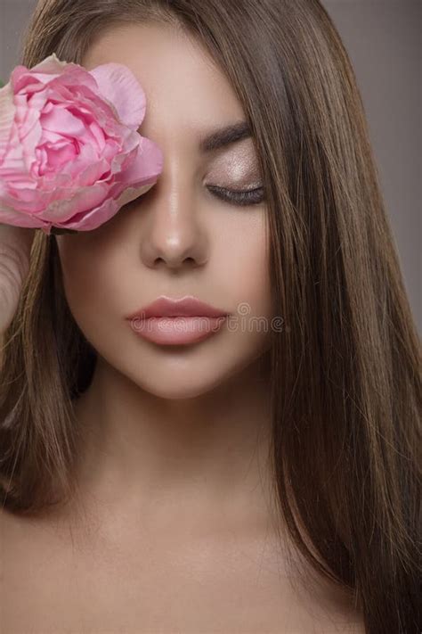 Portrait Of Beautiful Woman Shiny Straight Hair And Closed Eyes Flower