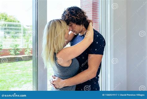 Couple Hugging In The Living Room Stock Image Image Of Hugging