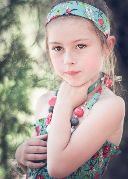Premium Photo | Cute girl looking away