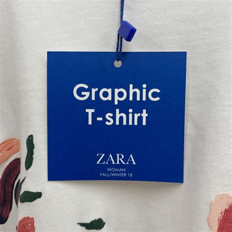 Yahoo オークション 未使用品 M ZARA ホワイト 花柄グラフィック半