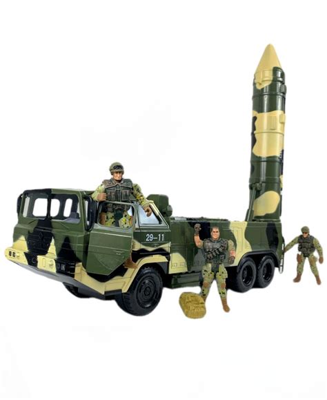 An Army Vehicle With Two Soldiers Next To It And A Rocket In The Back