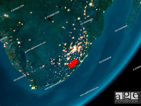 Night View Of Lesotho Highlighted In Red On Planet Earth With