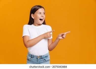 White Brunette Girl Expressing Surprise While Stock Photo