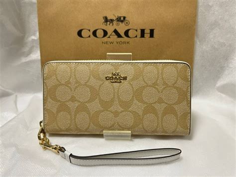 【未使用】1円スタート【新品未使用】コーチcoach長財布 シグネチャー C4452 ラウンドファスナー ストラップ付き ライトカーキ