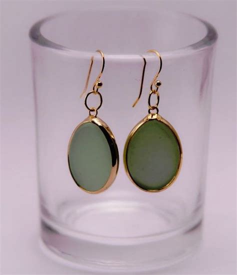 Sea Foam Green Glass Dangle Earrings Encased In Gold On Carat Gold