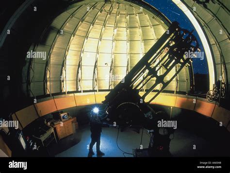 An Astronomer Uses A Classic Telescope To Study Planets And Stars From