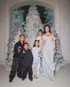 Kim Kardashian poses with all four kids in adorable Christmas photos as ...