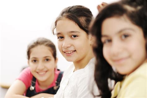 Premium Photo Happy Children Smiling And Laughing In The Classroom