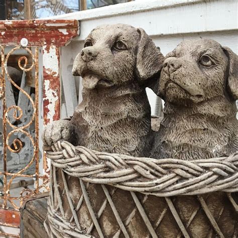 I love garden statues of all kinds! I saw these puppy dog garden ...