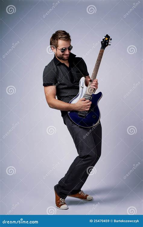 Rockstar guitar player stock image. Image of modern, instrument - 25470459