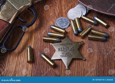 Wild West Rifle, Ammunition and Sheriff Badge Stock Photo - Image of ...