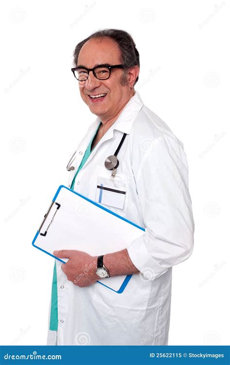 Senior Male Doctor Holding Blank Clipboard Royalty Free Stock Photo