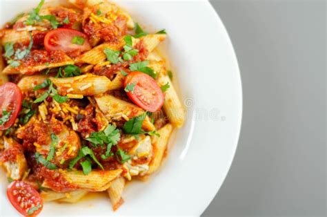 Penne Pasta with a Rich Tomato Sauce and Slices of British Pork Sausage ...