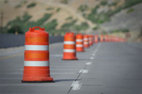 Orange And White Construction Cones Closing A Road Lane Stock Photo ...