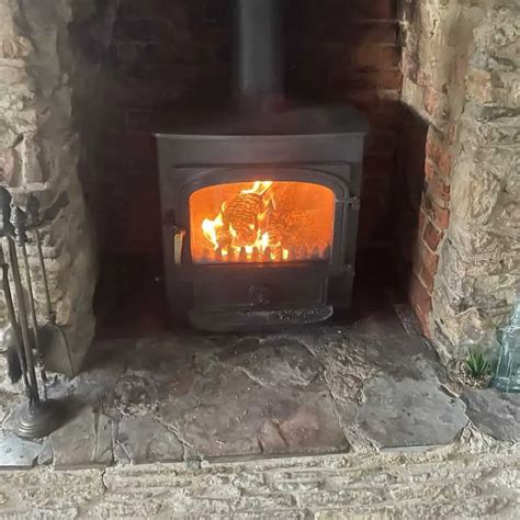 How To Keep Your Log Burner Going All Day And Night - Village & Cottage