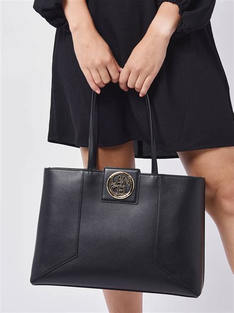 Sac porté épaule Lancel TOTE M ZIPPE noir doré en vente au meilleur prix