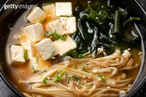 Rich Miso Soup With Enoki Mushrooms Wakame Seaweed And Tofu