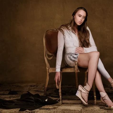 Alycia Debnam Carey Sitting On Chair Posing For Photo Stable