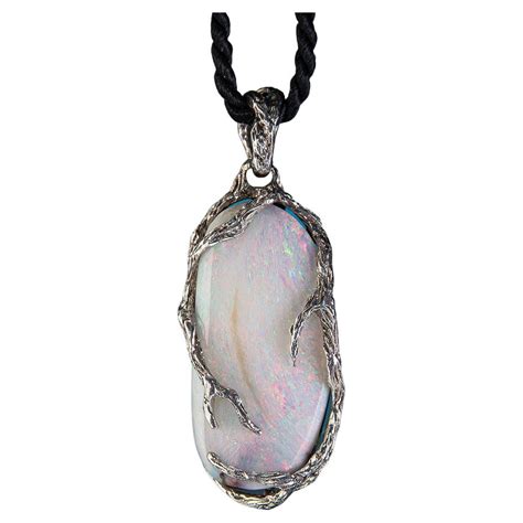 Natural Boulder Opal Freeform Pendant With Carat Total Of Round