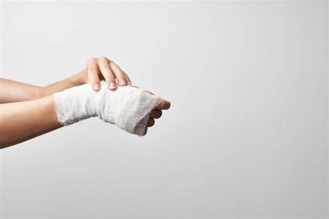 Premium Photo | Injured arm bandaged medicine traumatology