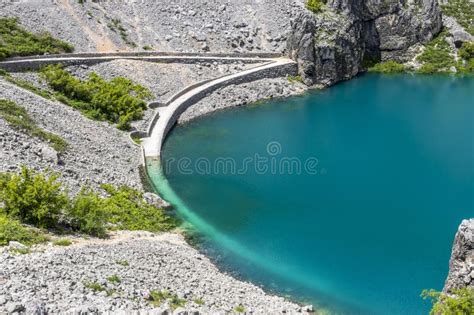 Blue Lake Called Modro Jezero At Imotski In Croatia Stock Photo