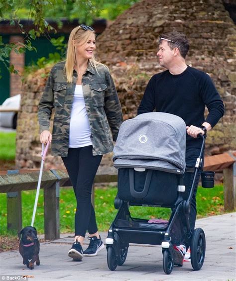 Declan Donnelly and Ali Astall take baby daughter Isla for a stroll ...