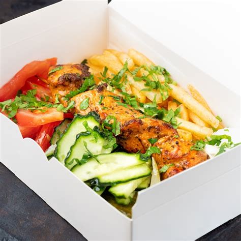 Premium Photo Fast Food Delivery Greek Souvlaki Salad And Gyros