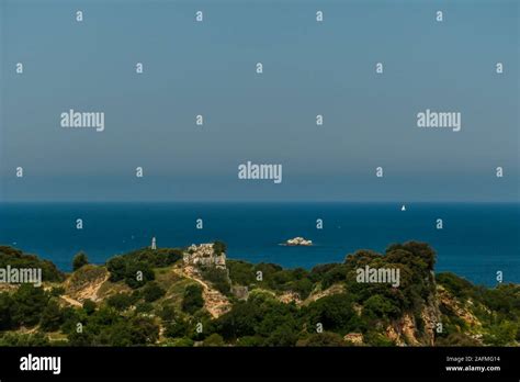 A view on the ruins of a castle seen from a hill above the ruins. The castle was located at the ...