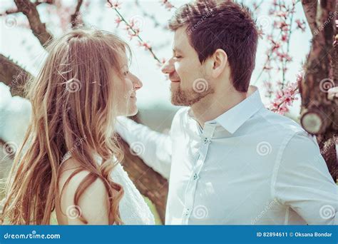 Young Happy Couple In Love Outdoors Loving Man And Woman On A Walk At