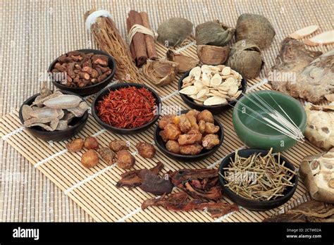 Traditional Chinese Herbal Medicine With Acupuncture Needles Herb