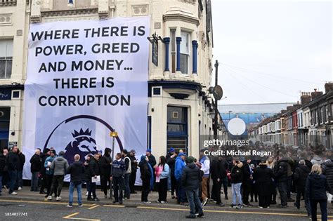 Fans of Everton display a protest banner on the outside of The Brick ...