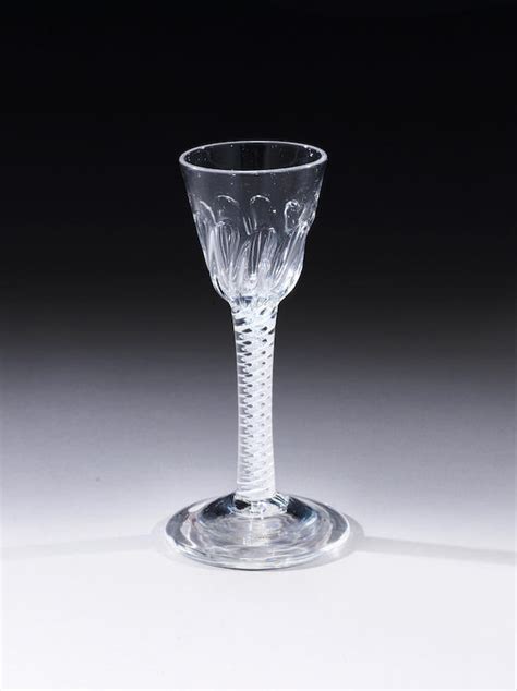 Bonhams An Unusual Opaque Twist Wine Glass Circa 1765