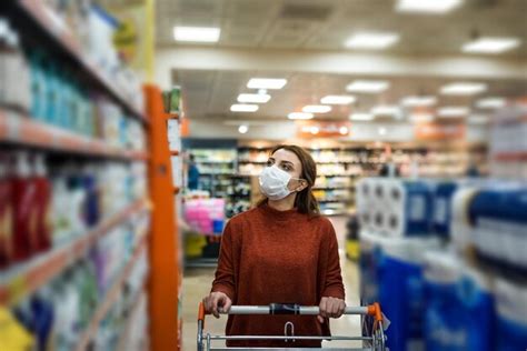 Premium Photo Woman Wearing Mask Shopping At Mall