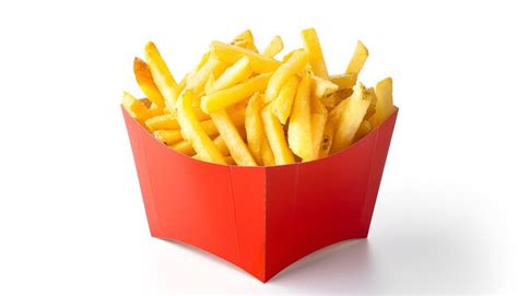 French Fries Or Fried Potatoes In A Red Carton Box Isolated On White Background With Clipping