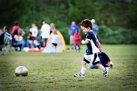 Soccer kid kicking soccer ball | morrismendez.com