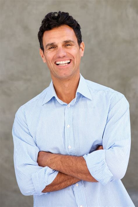 Handsome Mature Man Smiling With Arms Crossed Stock Image Image Of