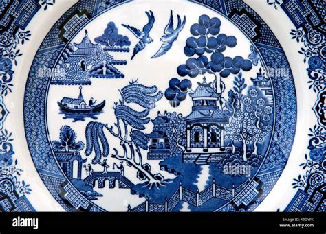 Traditional Willow Pattern Design On An English Blue And White Style